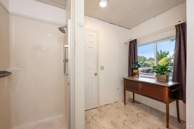 a view of a outdoor sitting area with furniture