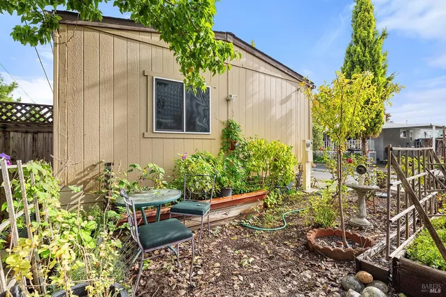 a sign board with a yard