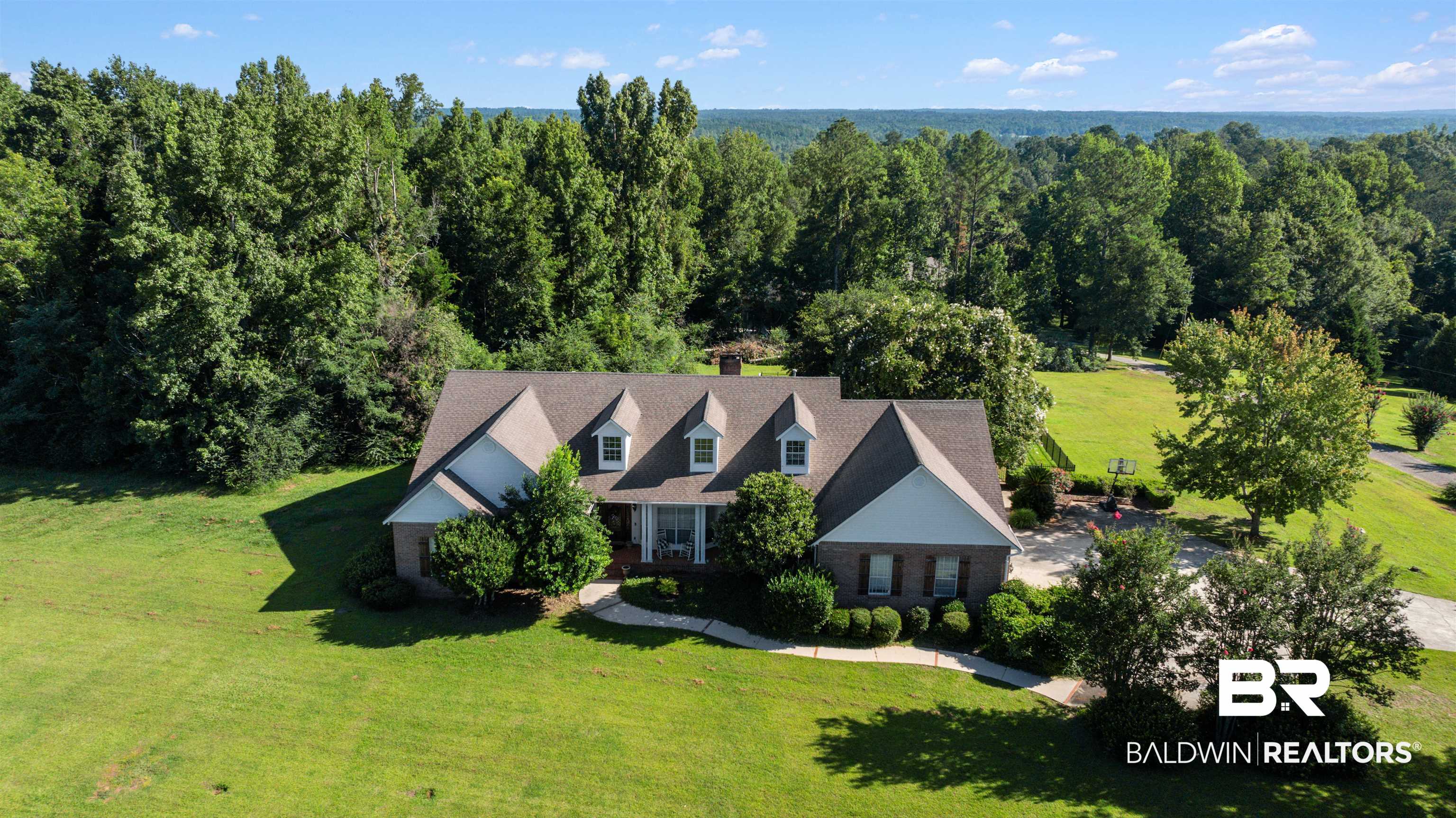 141 Blue Ridge Drive Monroeville, AL 36460 - Photo 40 of 40 Aerial view of property and surrounding area with a forest