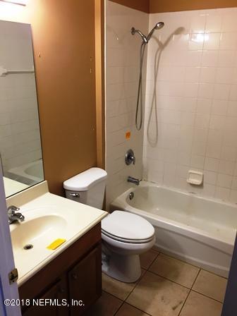 1816 Cross Pointe Way St. Augustine, FL 32092 - Photo 14 of 19 a bathroom with a toilet and a shower