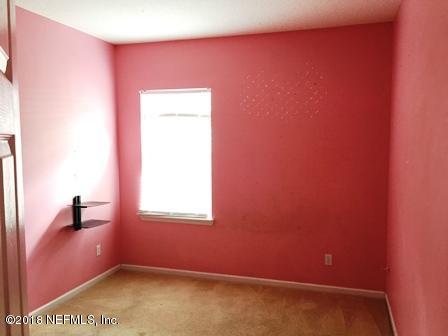 1816 Cross Pointe Way St. Augustine, FL 32092 - Photo 15 of 19 a view of an empty room with a window