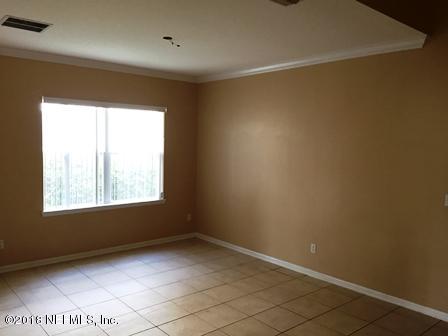 1816 Cross Pointe Way St. Augustine, FL 32092 - Photo 4 of 19 an empty room with a window