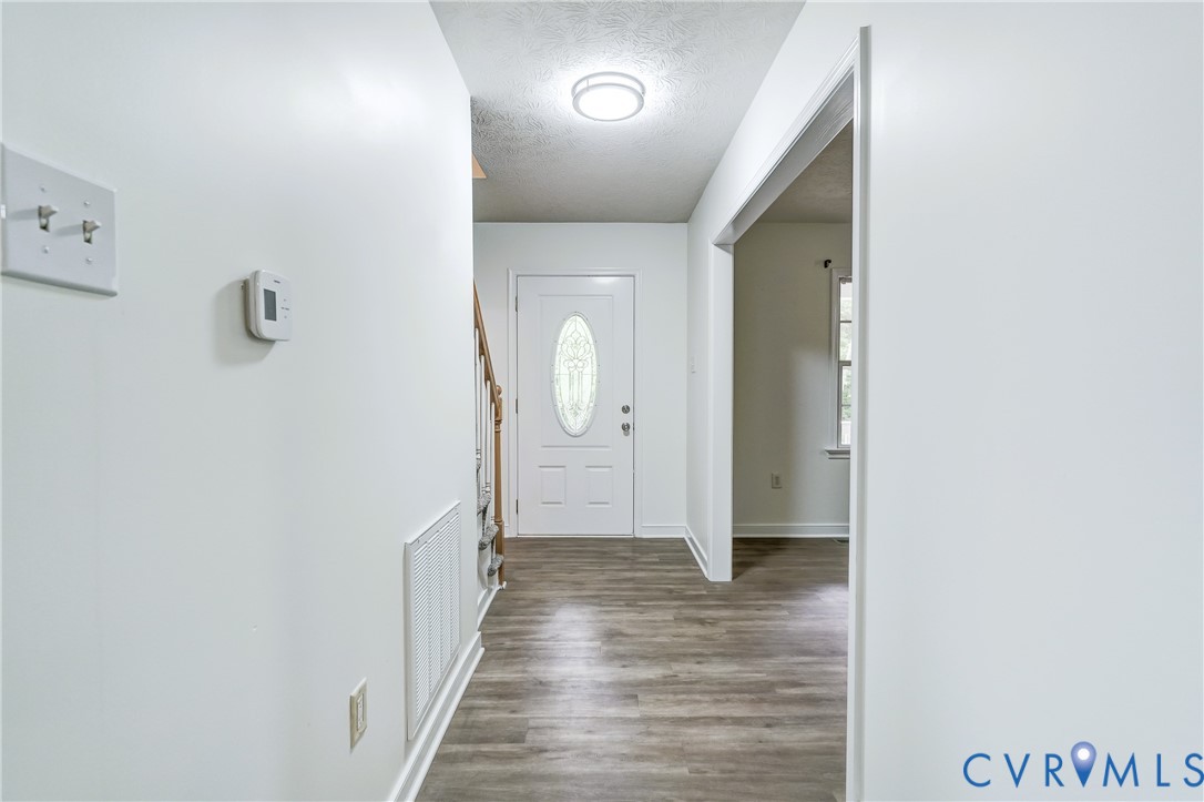 3820 Mt Pleasant Road Providence Forge, VA 23140 - Photo 15 of 40 a view of a hallway with wooden floor