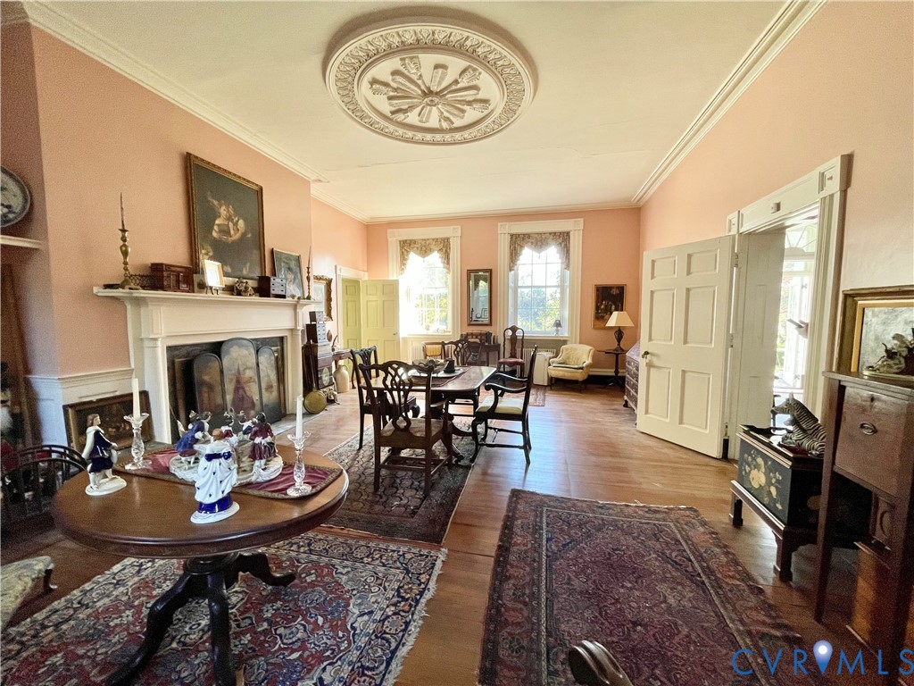 287 Rowes Landing Road Heathsville, VA 22473 - Photo 24 of 60 a living room with furniture a fireplace and a table