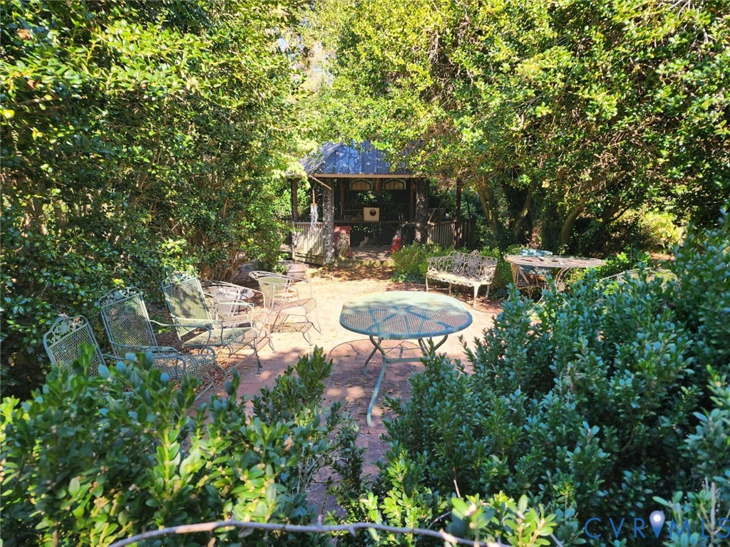 287 Rowes Landing Road Heathsville, VA 22473 - Photo 33 of 60 a view of a chairs and table in the backyard