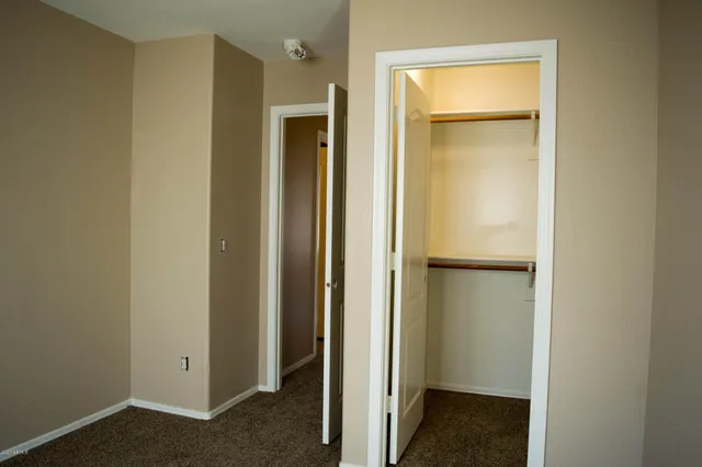 a view of a bathroom with a glass door and a shower