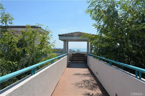 a view of balcony and yard