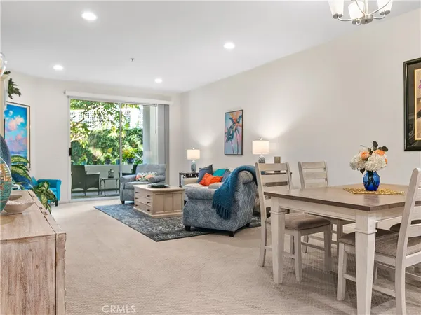 a view of a couches in the patio and a potted plant