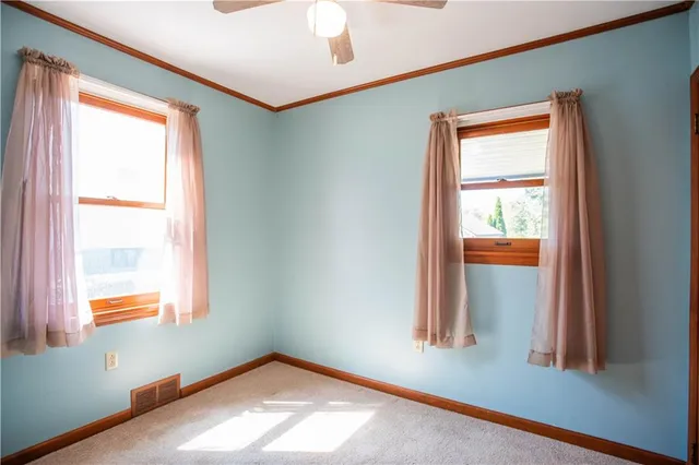 a view of an empty room and window