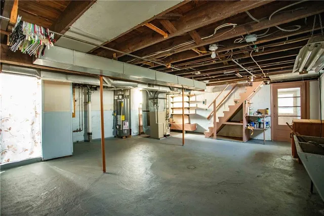 a view of a room with wooden floor and outdoor space