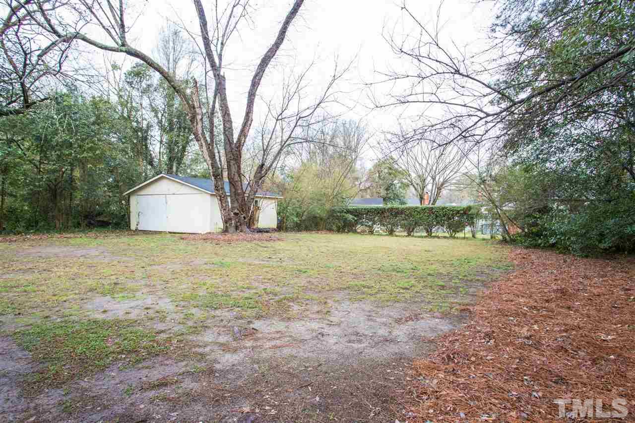 631 Brighton Road Raleigh, NC 27610 - Photo 21 of 25 a view of backyard with large trees