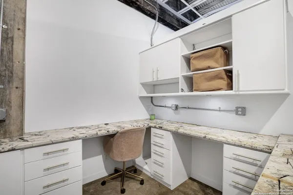 a view of cabinets with wooden floor and cabinet