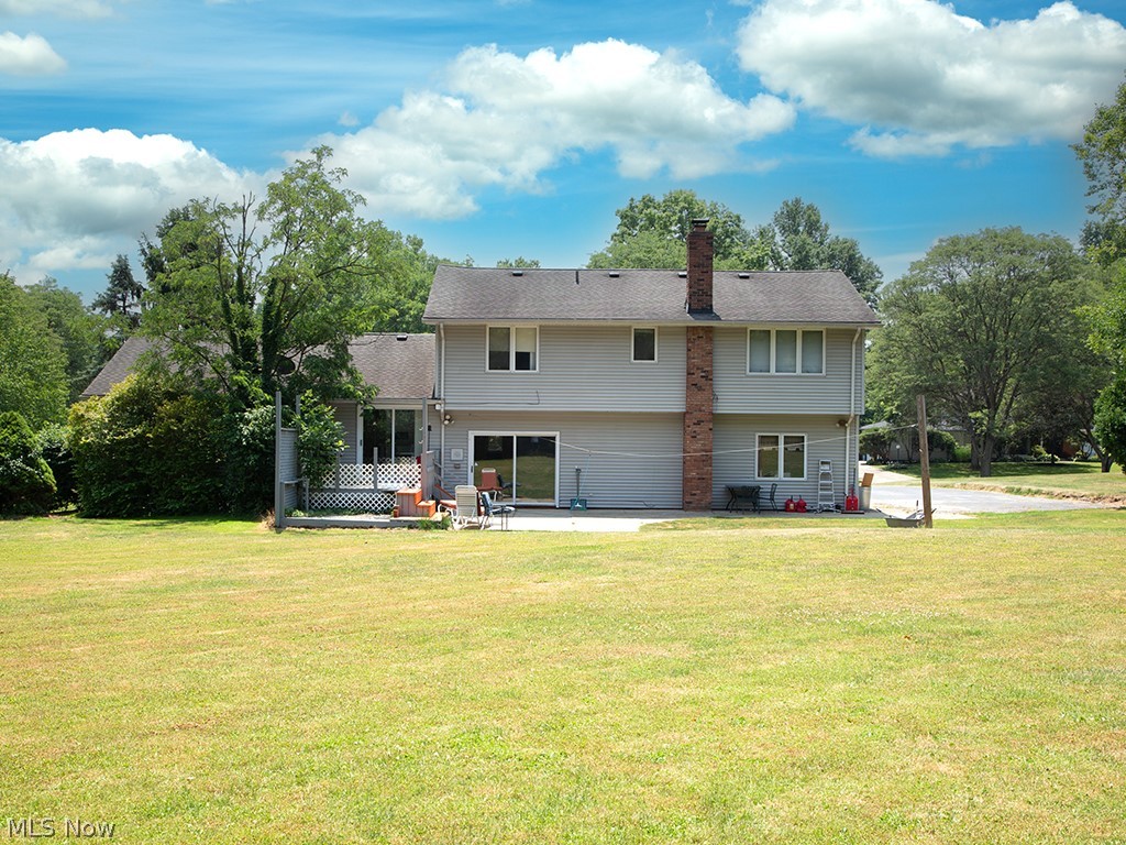 29399 Bryce Road Cleveland, OH 44124 - Photo 26 of 31 Back of house with a lawn and a patio area