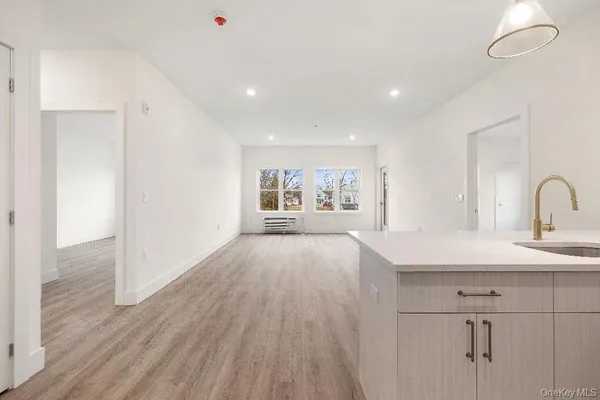 a view of a balcony with wooden floor