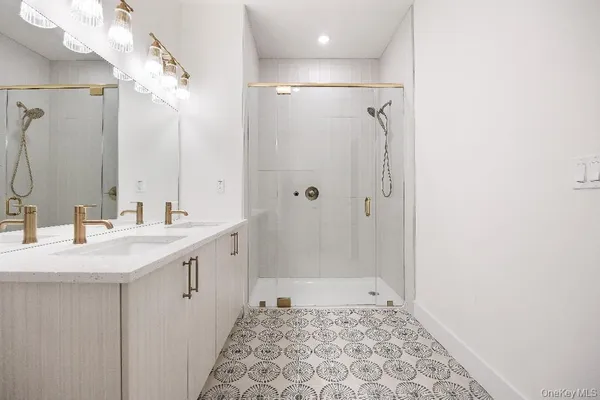 a view of a hallway with washer and dryer