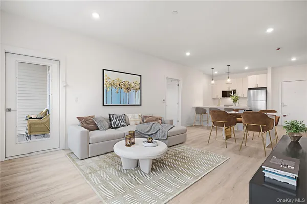 a kitchen with refrigerator a sink and cabinets
