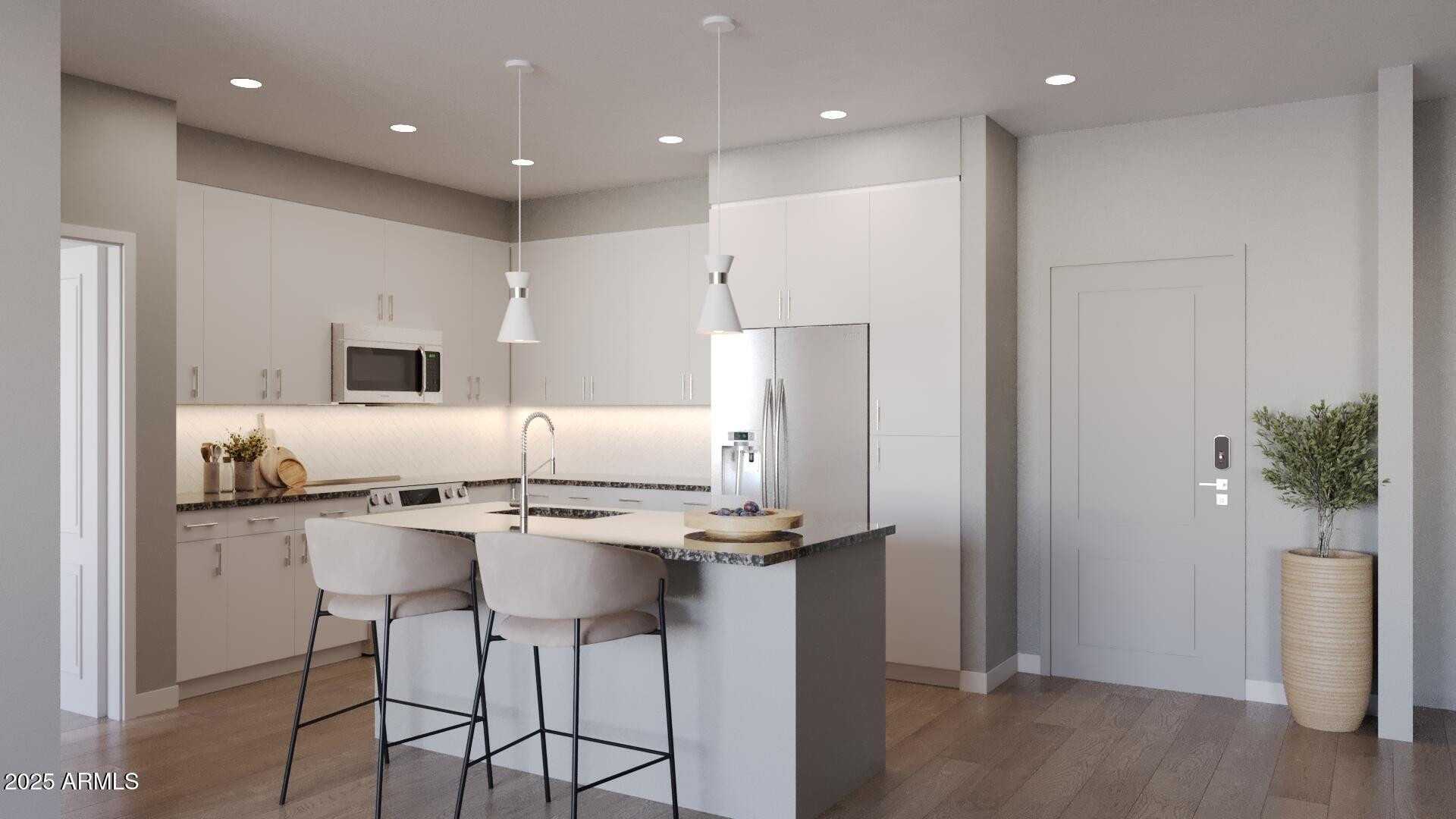 2375 West Frye Road, Unit 1 Chandler, AZ 85224 - Photo 2 of 18 a kitchen with stainless steel appliances kitchen island granite countertop a refrigerator and a stove top oven with wooden floor