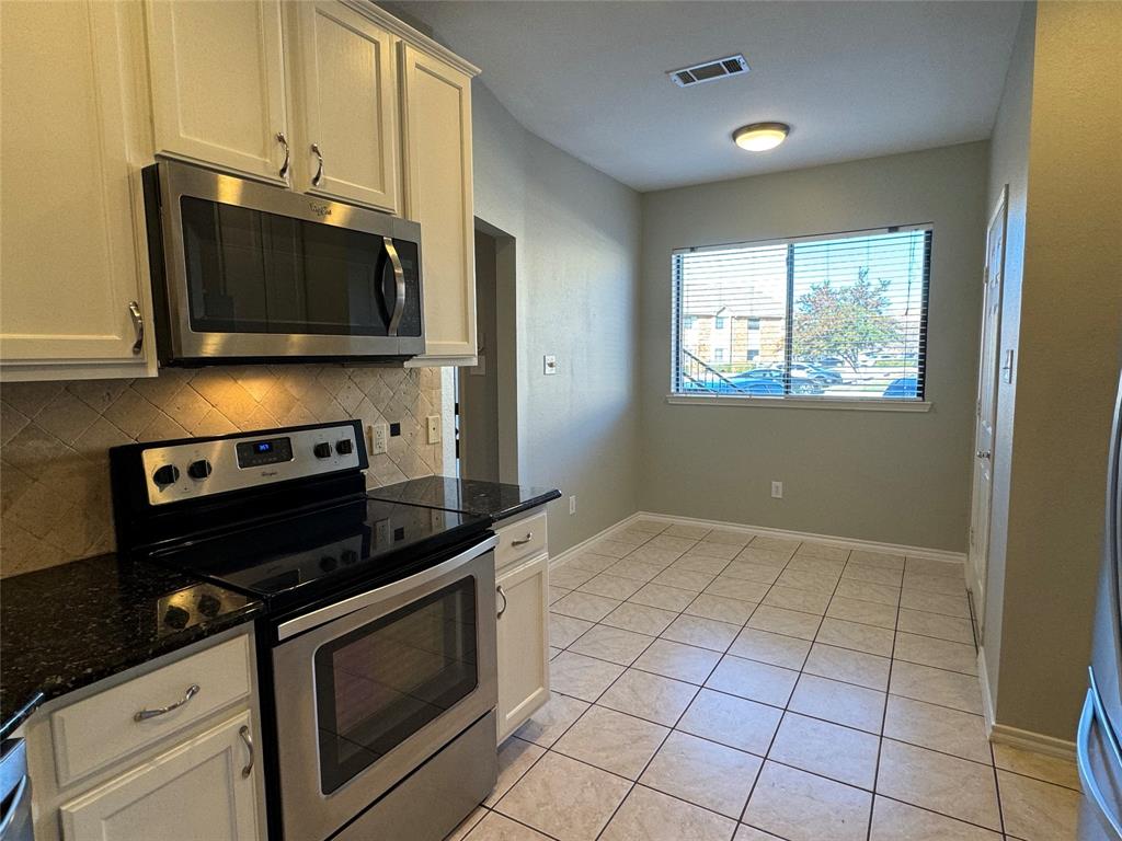 2026 Signal Ridge Place Rockwall, TX 75032 - Photo 6 of 23 Kitchen and Breakfast Area