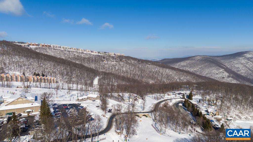 105 Eagles Court Wintergreen, VA 22967 - Photo 32 of 47 a view of swimming pool and mountain in back