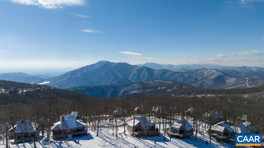 105 Eagles Court Wintergreen, VA 22967 - Photo 35 of 47 a view of a lake with a mountain