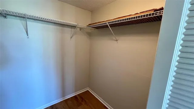 a view of a livingroom with wooden floor