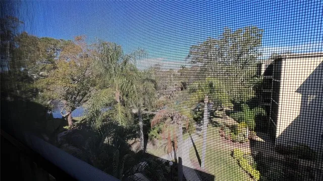 a view of a wooden floor and lake