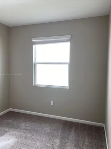 a bathroom with a toilet a sink and bathtub