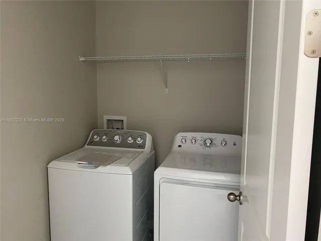 a bathroom with a toilet a sink and bathtub