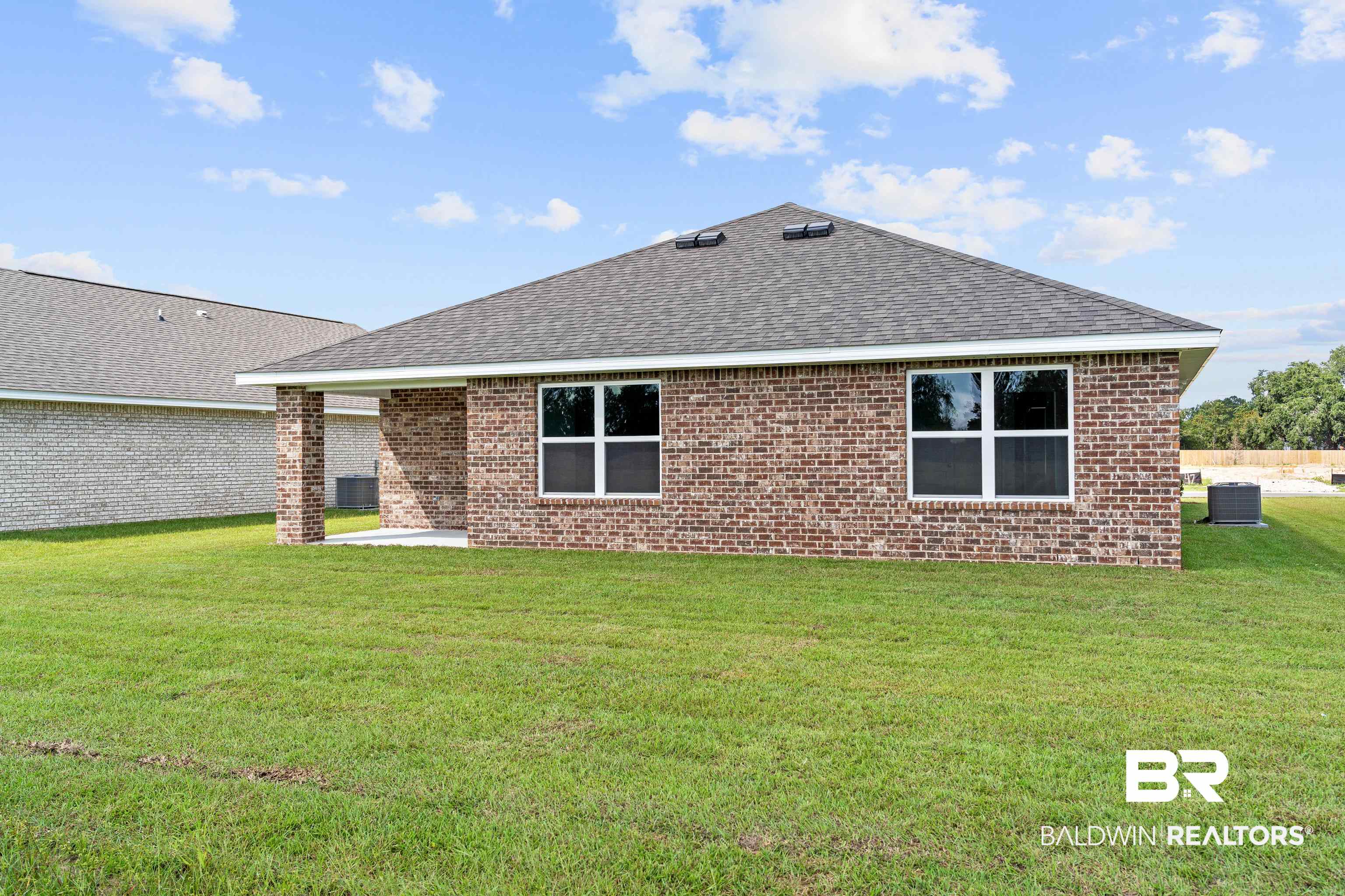 14615 Dayton Circle Foley, AL 36535 - Photo 27 of 27 Brick exterior with a covered patio and a shingle roof