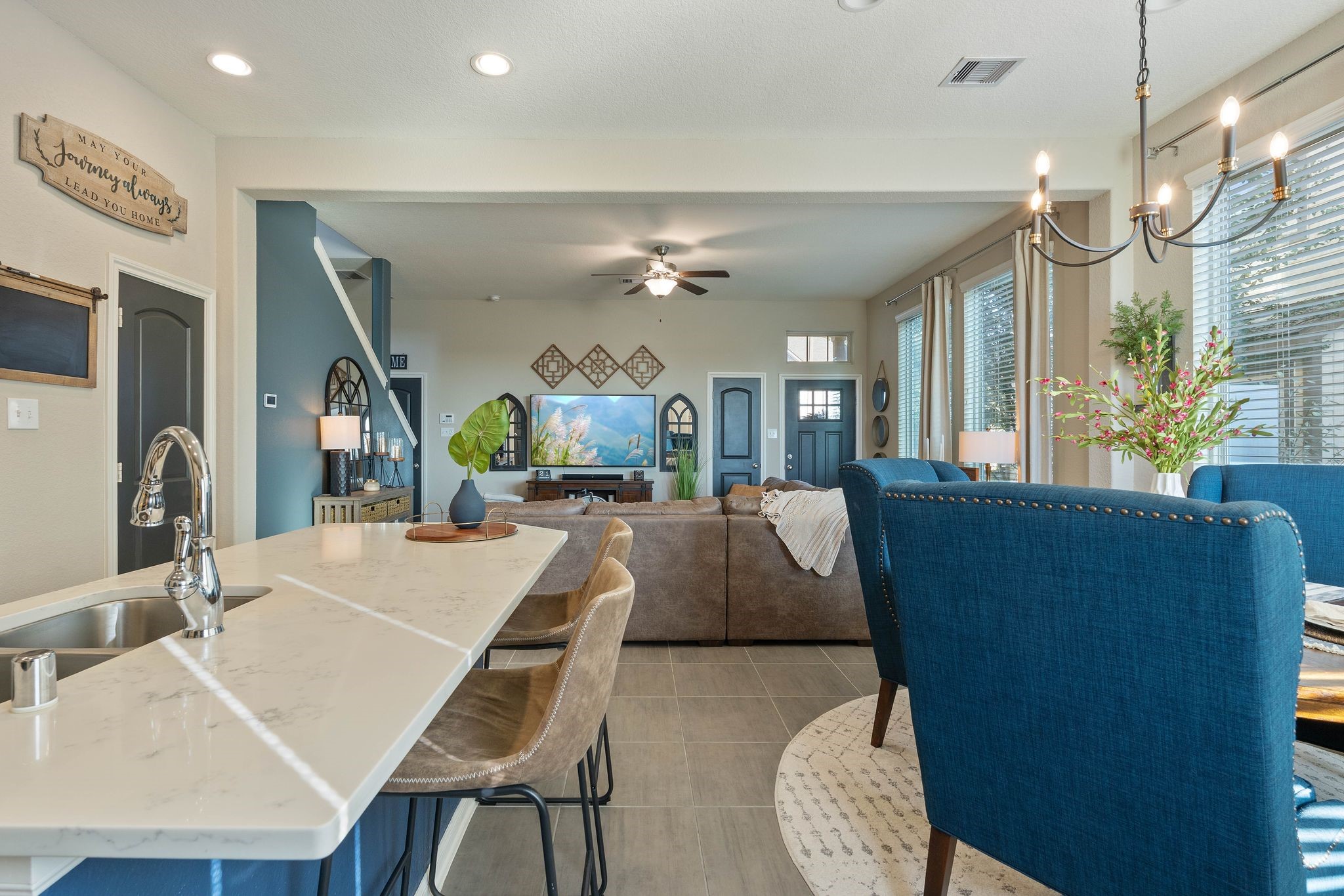 227 Biltmore Loop Montgomery, TX 77316 - Photo 12 of 33 a living room with furniture a large window and a table