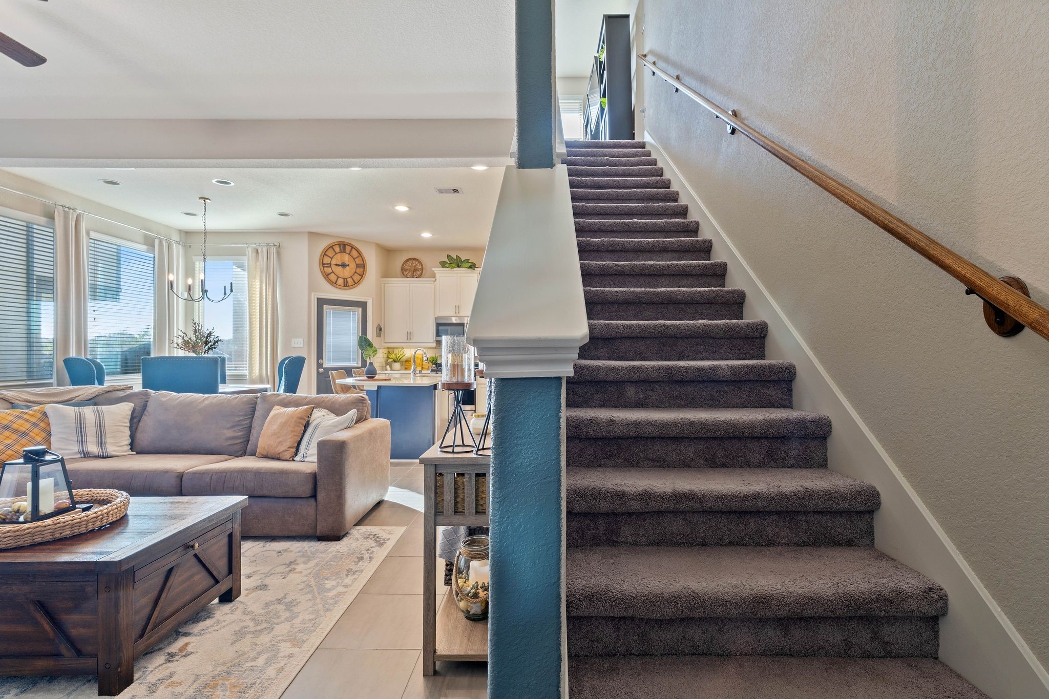 227 Biltmore Loop Montgomery, TX 77316 - Photo 14 of 33 a living room with furniture and a stair