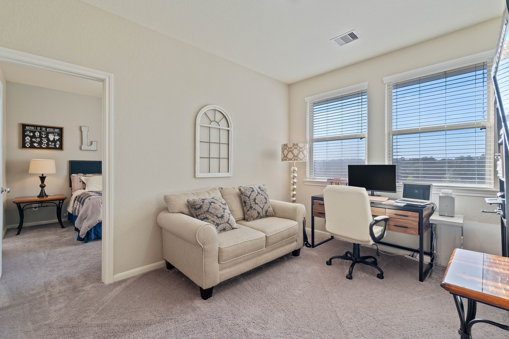 227 Biltmore Loop Montgomery, TX 77316 - Photo 15 of 33 a living room with furniture and a flat screen tv