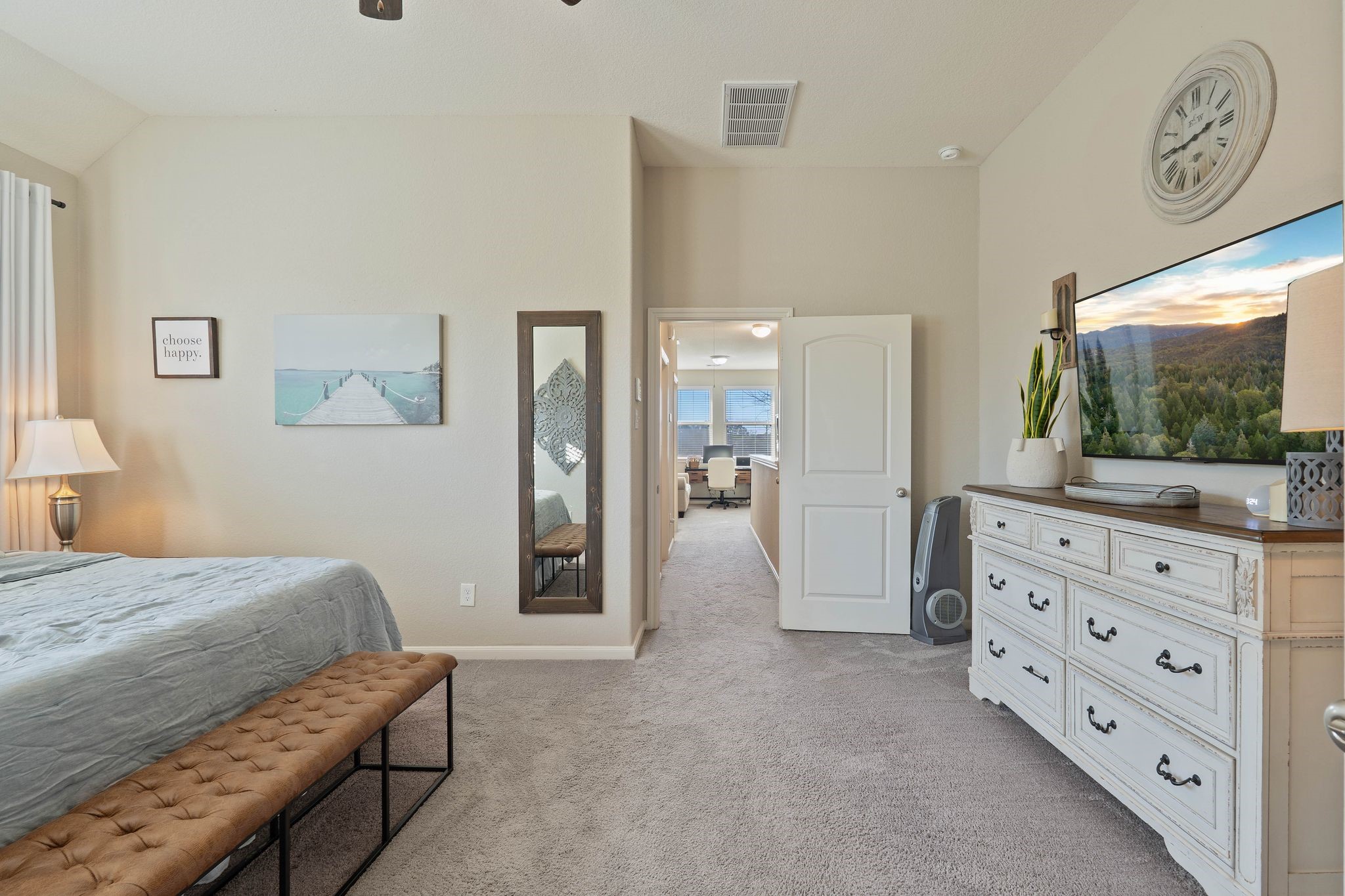 227 Biltmore Loop Montgomery, TX 77316 - Photo 21 of 33 a bedroom with a bed and a flat screen tv