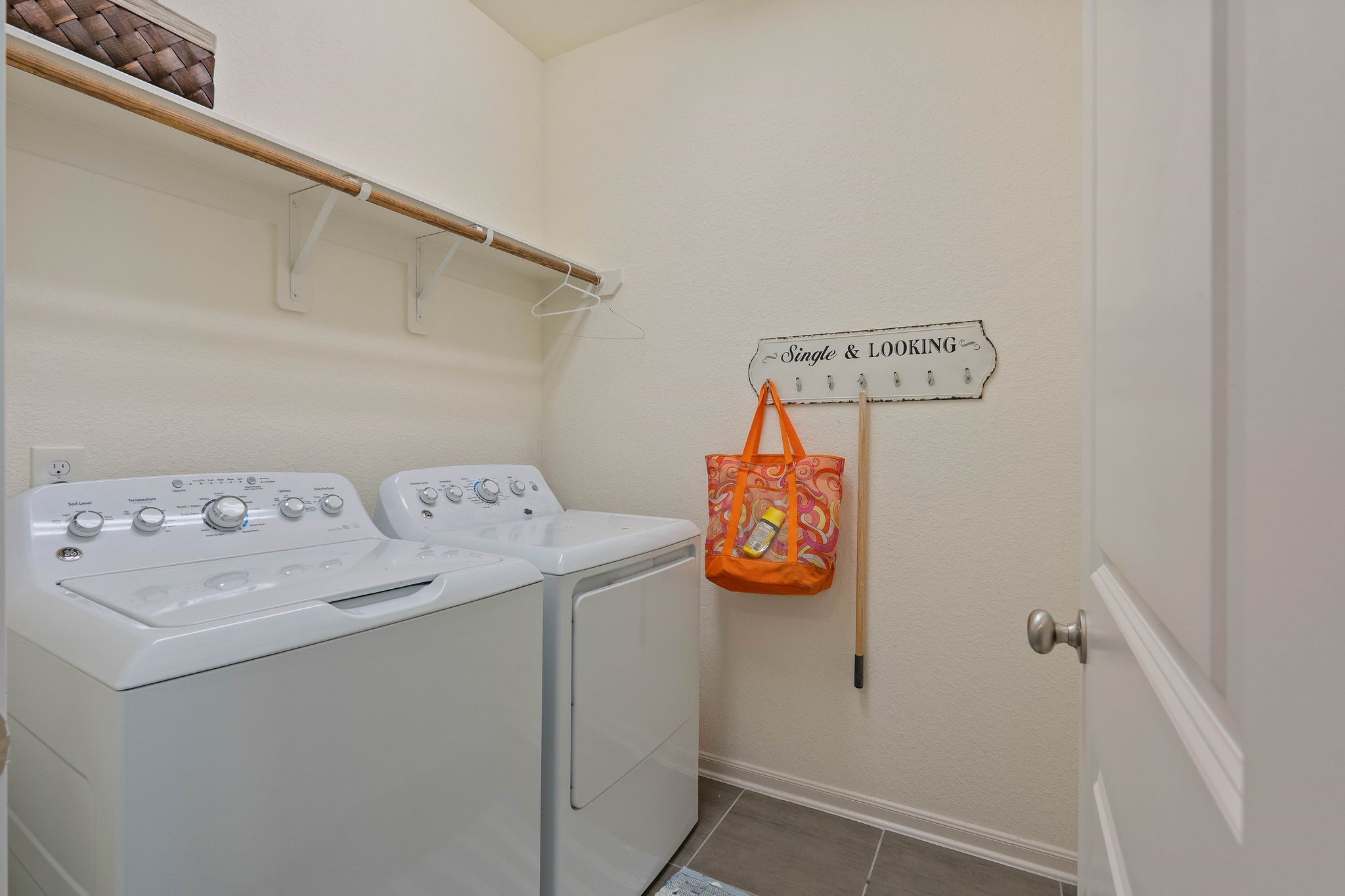 227 Biltmore Loop Montgomery, TX 77316 - Photo 25 of 33 a utility room with dryer and washer
