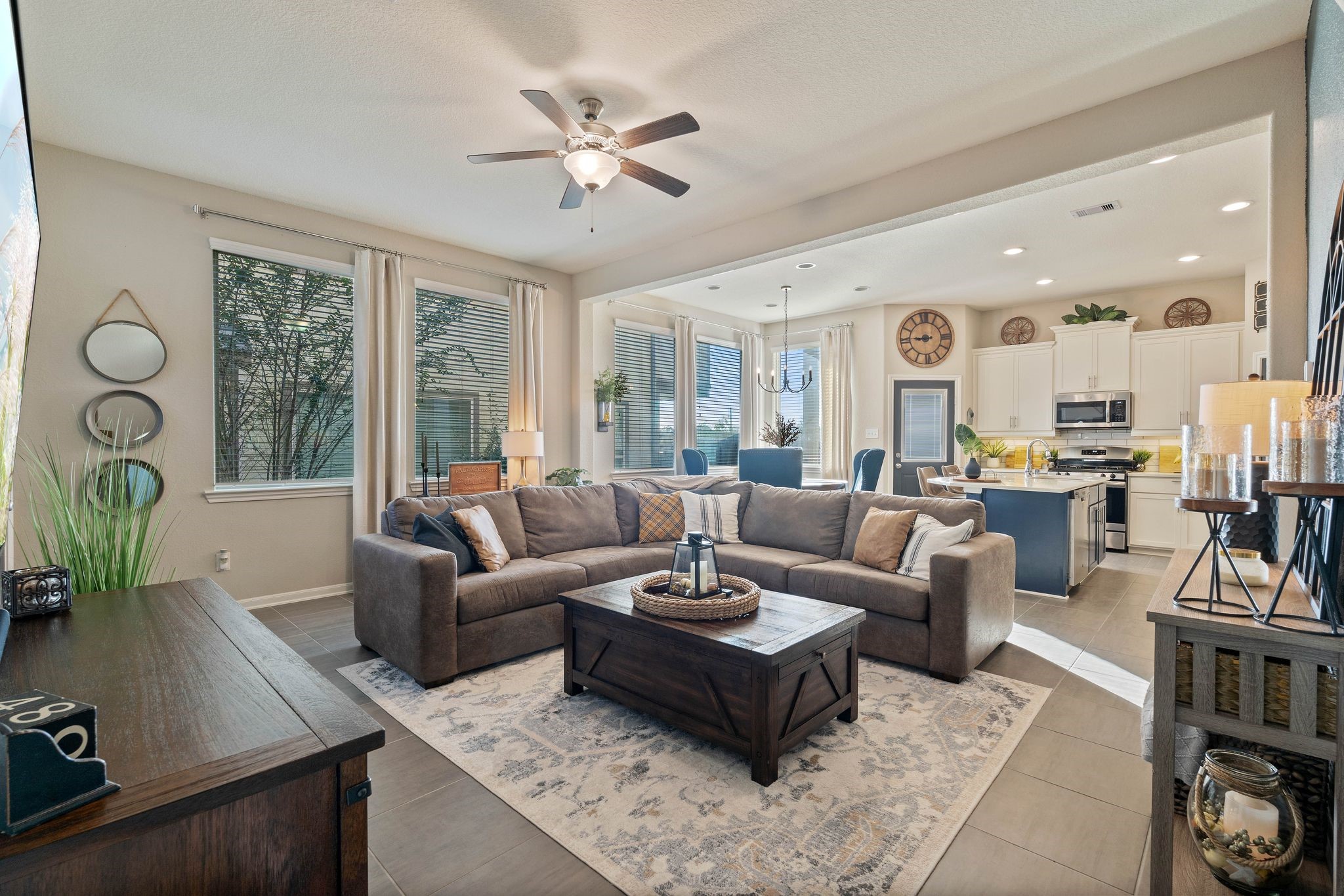 227 Biltmore Loop Montgomery, TX 77316 - Photo 4 of 25 a living room with furniture kitchen view and a large window