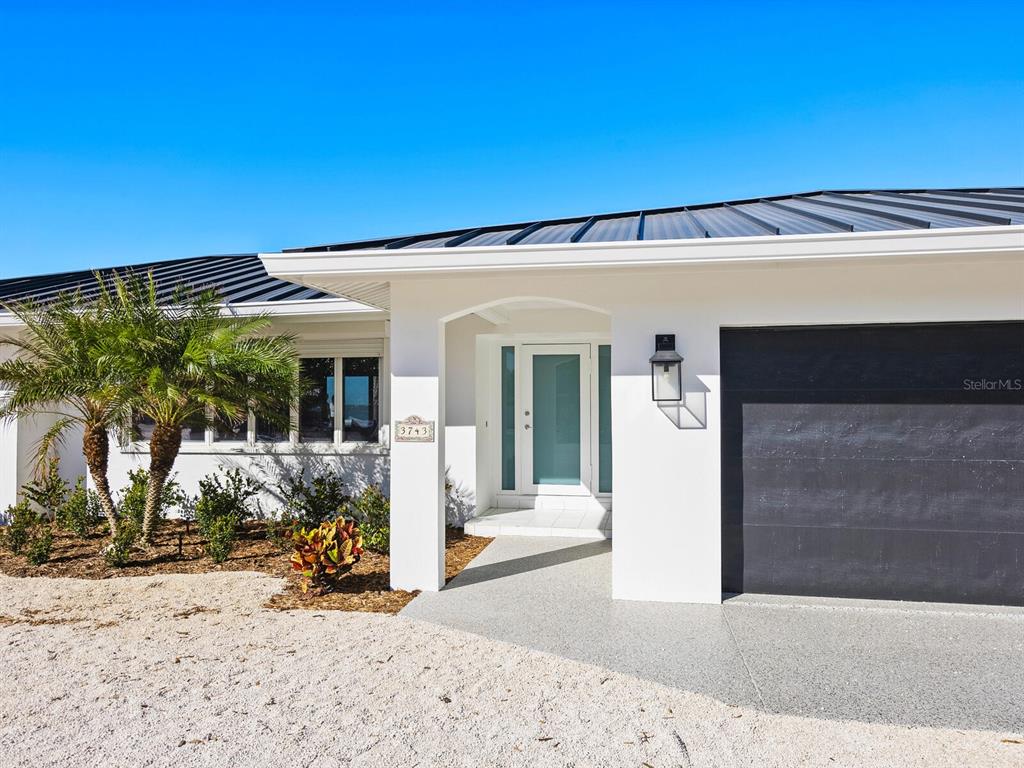 3743 Casey Key Road Nokomis, FL 34275 - Photo 30 of 36 front view of a house