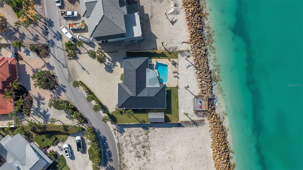 3743 Casey Key Road Nokomis, FL 34275 - Photo 3 of 36 a aerial view of a house with a yard