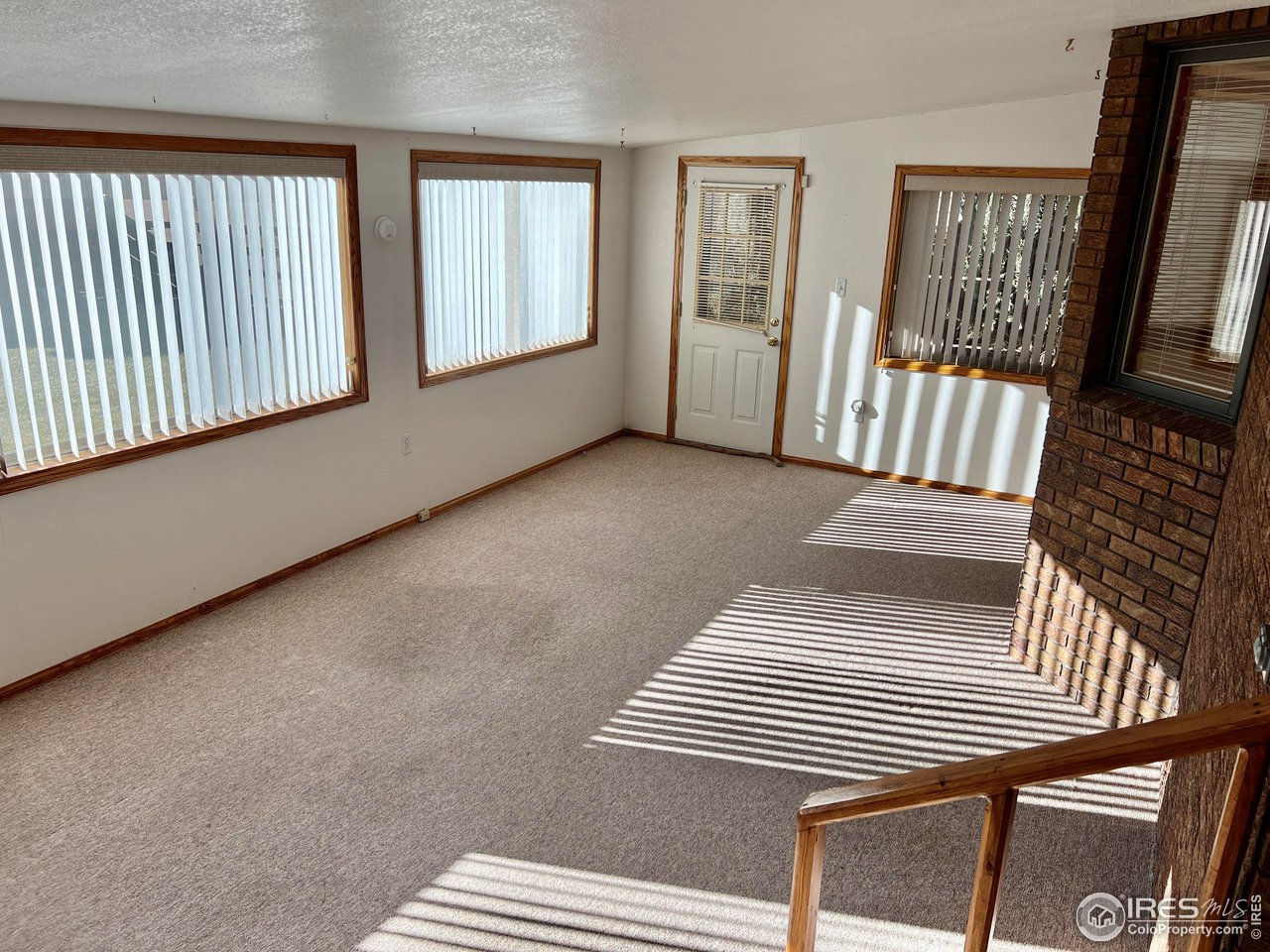 1630 Robin Road Sterling, CO 80751 - Photo 24 of 37 Back enclosed patio