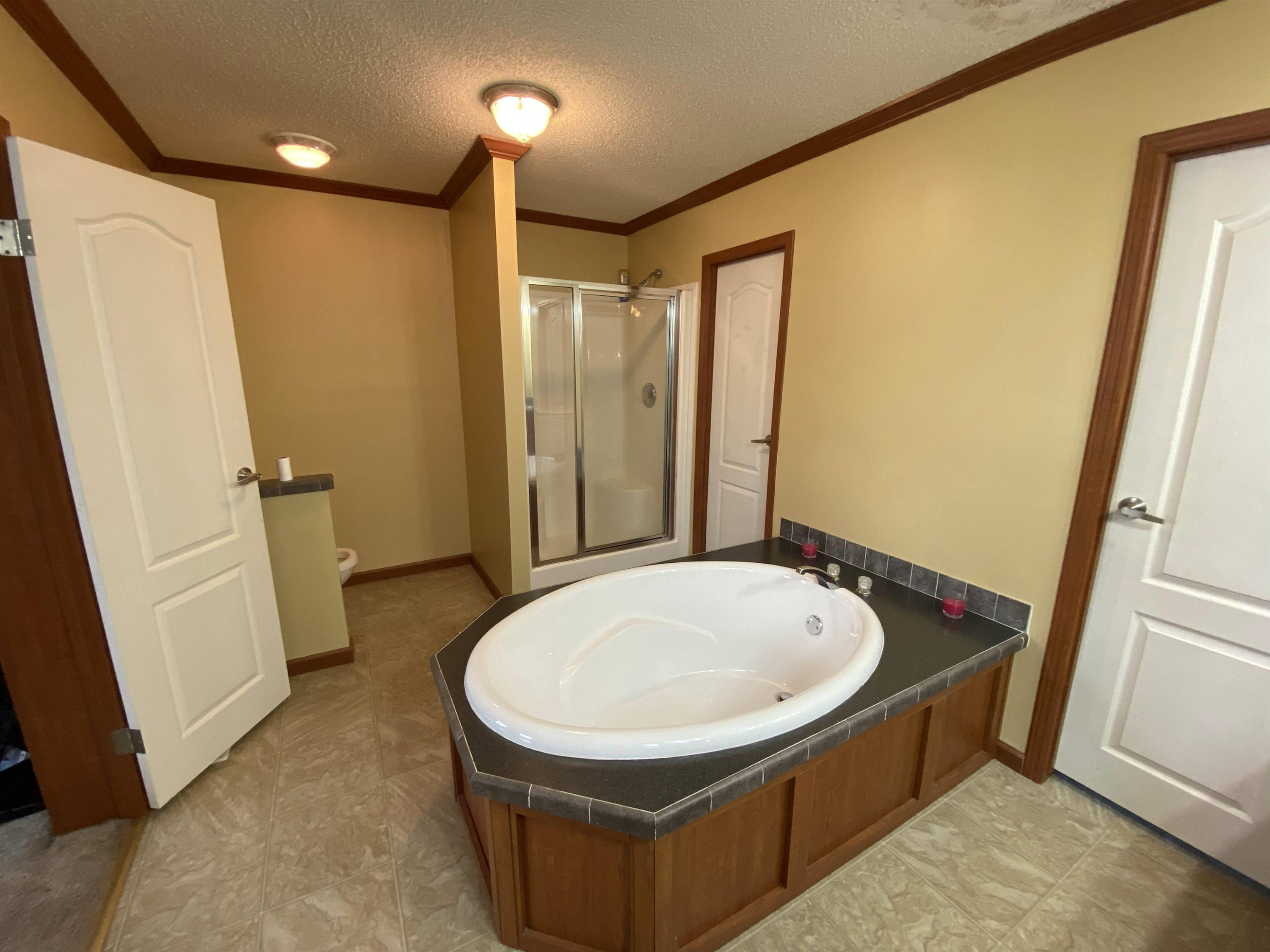 115 Bridgers Road Kenly, NC 27542 - Photo 17 of 30 a bathroom with a tub and a sink