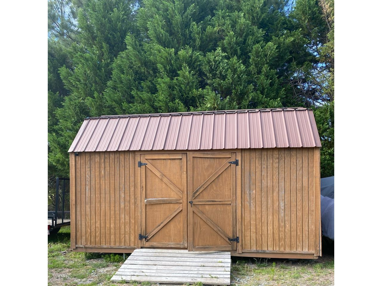 115 Bridgers Road Kenly, NC 27542 - Photo 8 of 30 a view of a white house with wooden fence