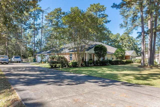 a view of a trees in front of a building