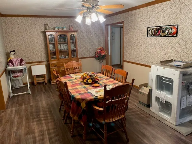 a view of a dining room with furniture