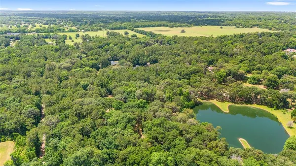 a view of a lake with a house
