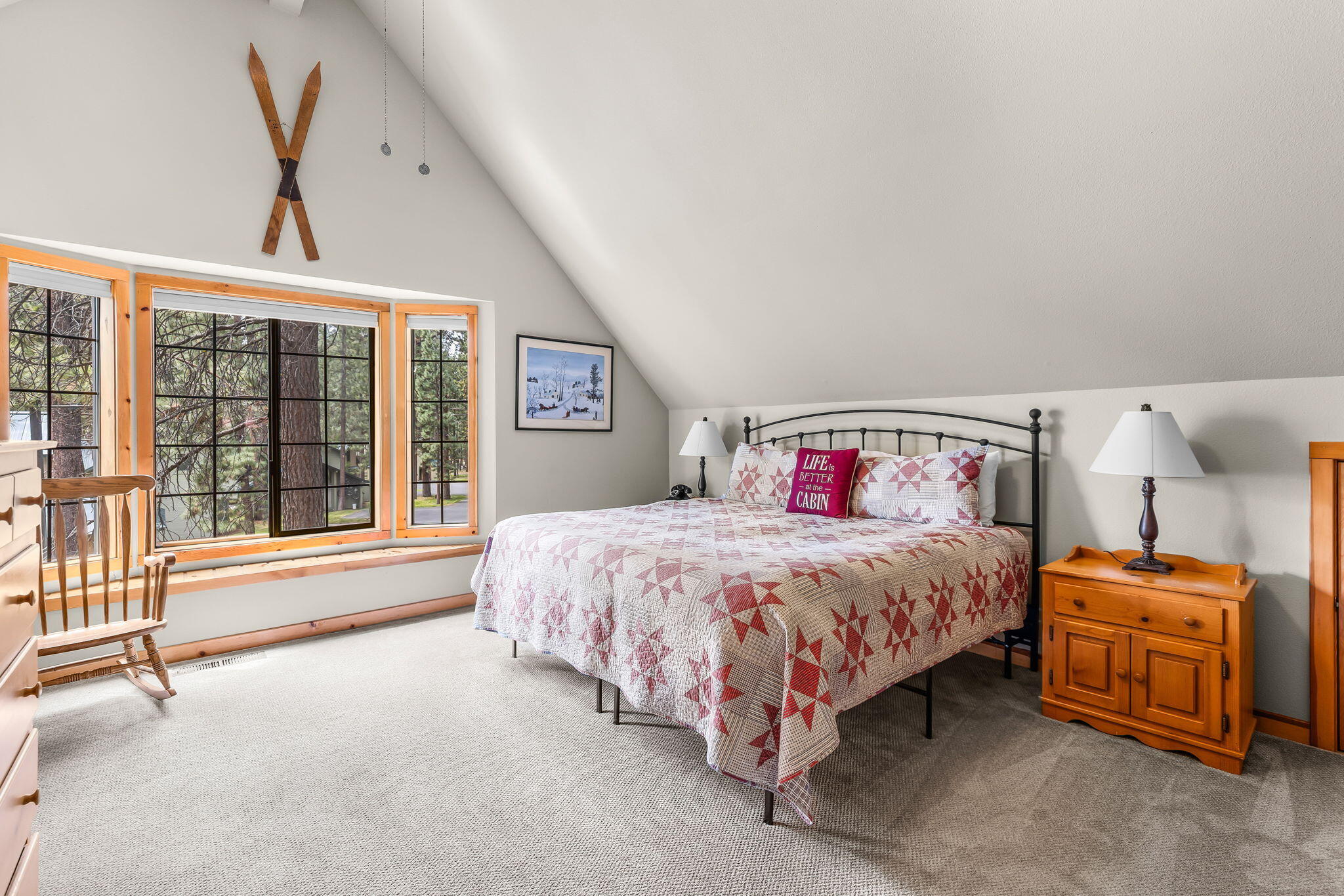 57505 Circle 4 Cabin Road, Unit 29 Sunriver, OR 97707 - Photo 20 of 35 a bedroom with a bed and a large window
