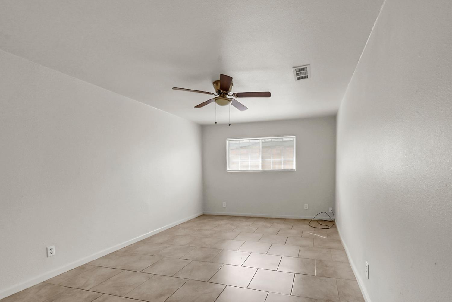 72 East 12th Street Merced, CA 95341 - Photo 5 of 13 a view of an empty room