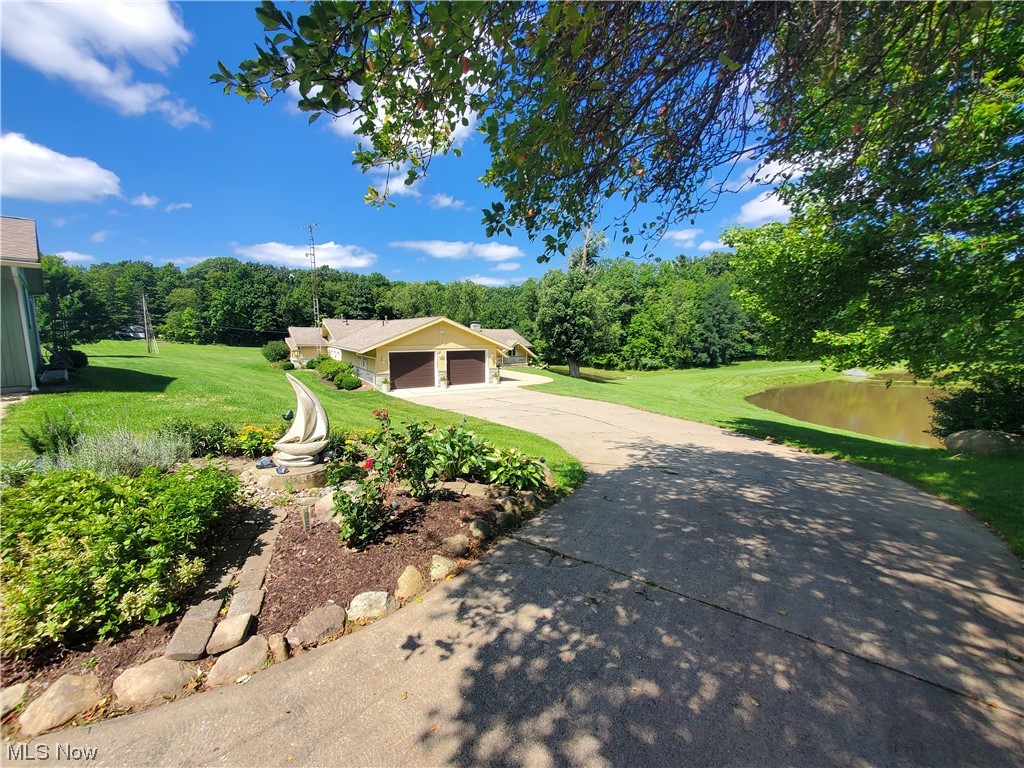 9604 Angling Road Wakeman, OH 44889 - Photo 33 of 34 Driveway leading from the Workshop/Garage to your home.