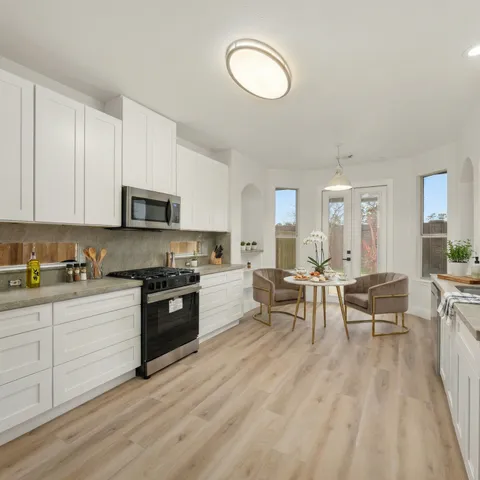 a view of livingroom with hardwood floor and a ceiling fan