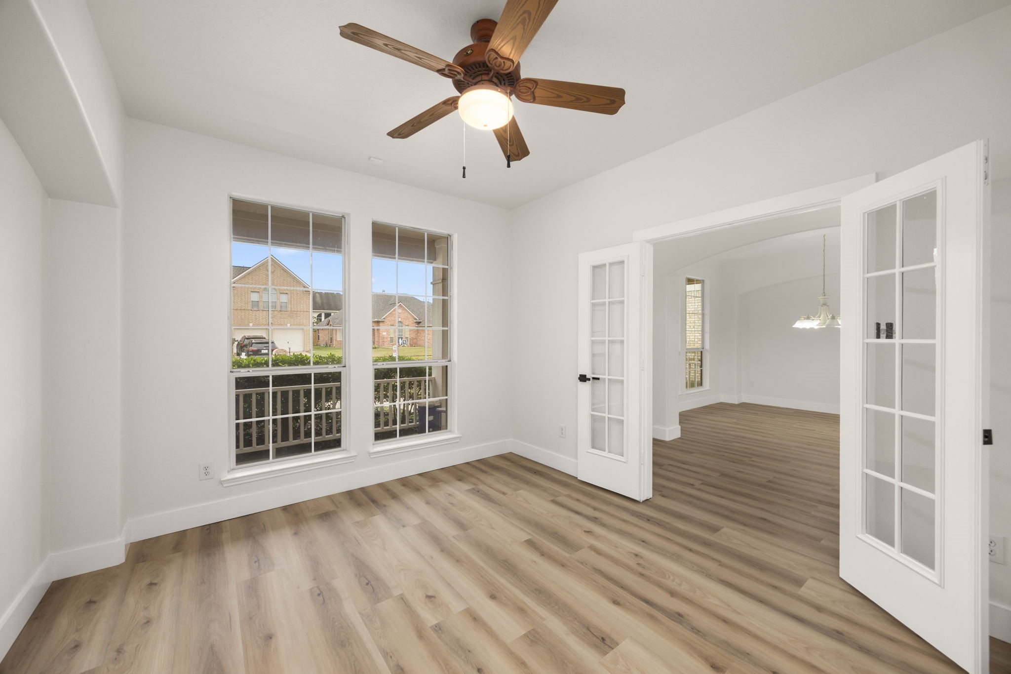 20923 Bayeux Lane Spring, TX 77388 - Photo 21 of 50 a view of livingroom with hardwood floor and a ceiling fan