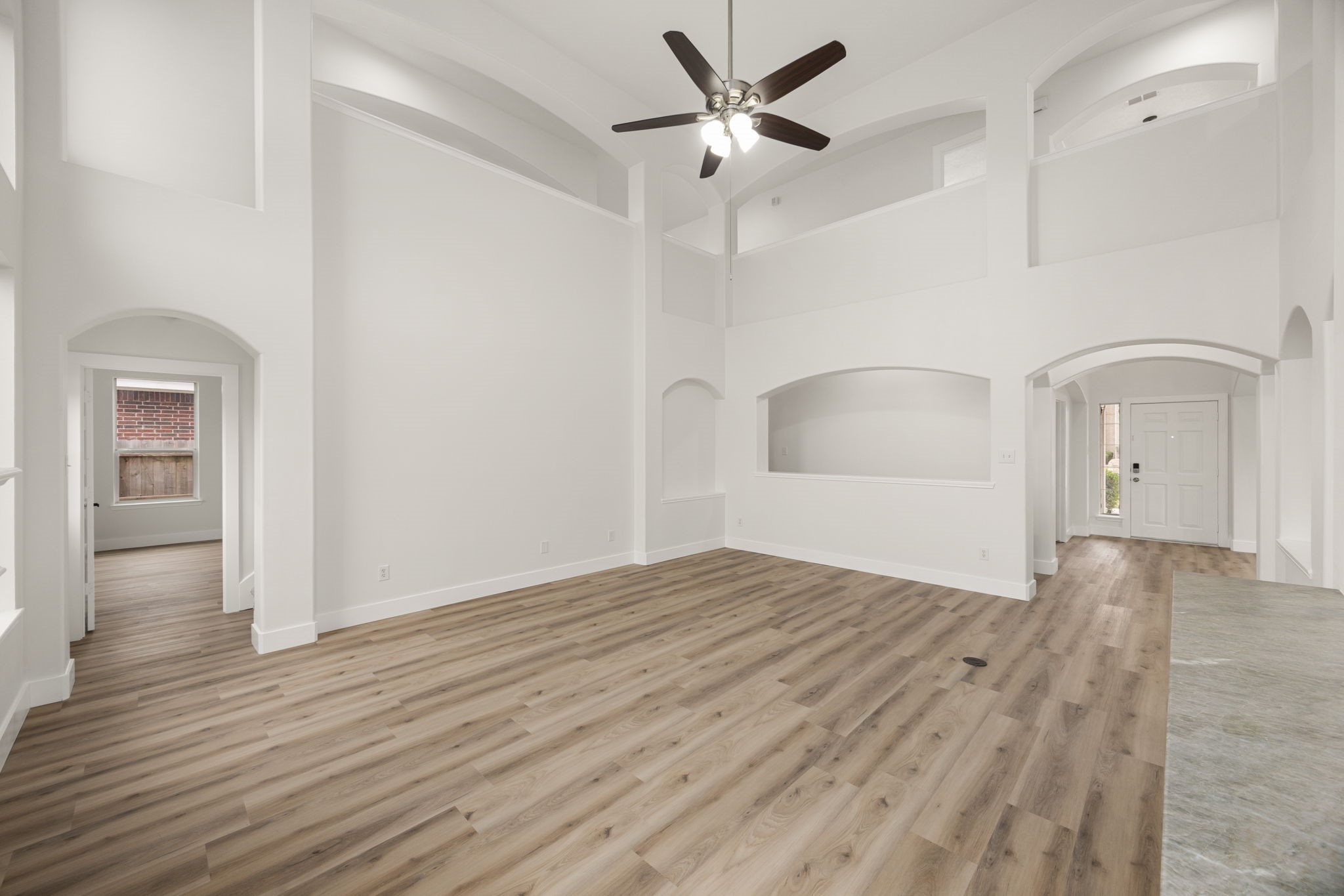 20923 Bayeux Lane Spring, TX 77388 - Photo 27 of 50 a view of empty room with wooden floor and fan
