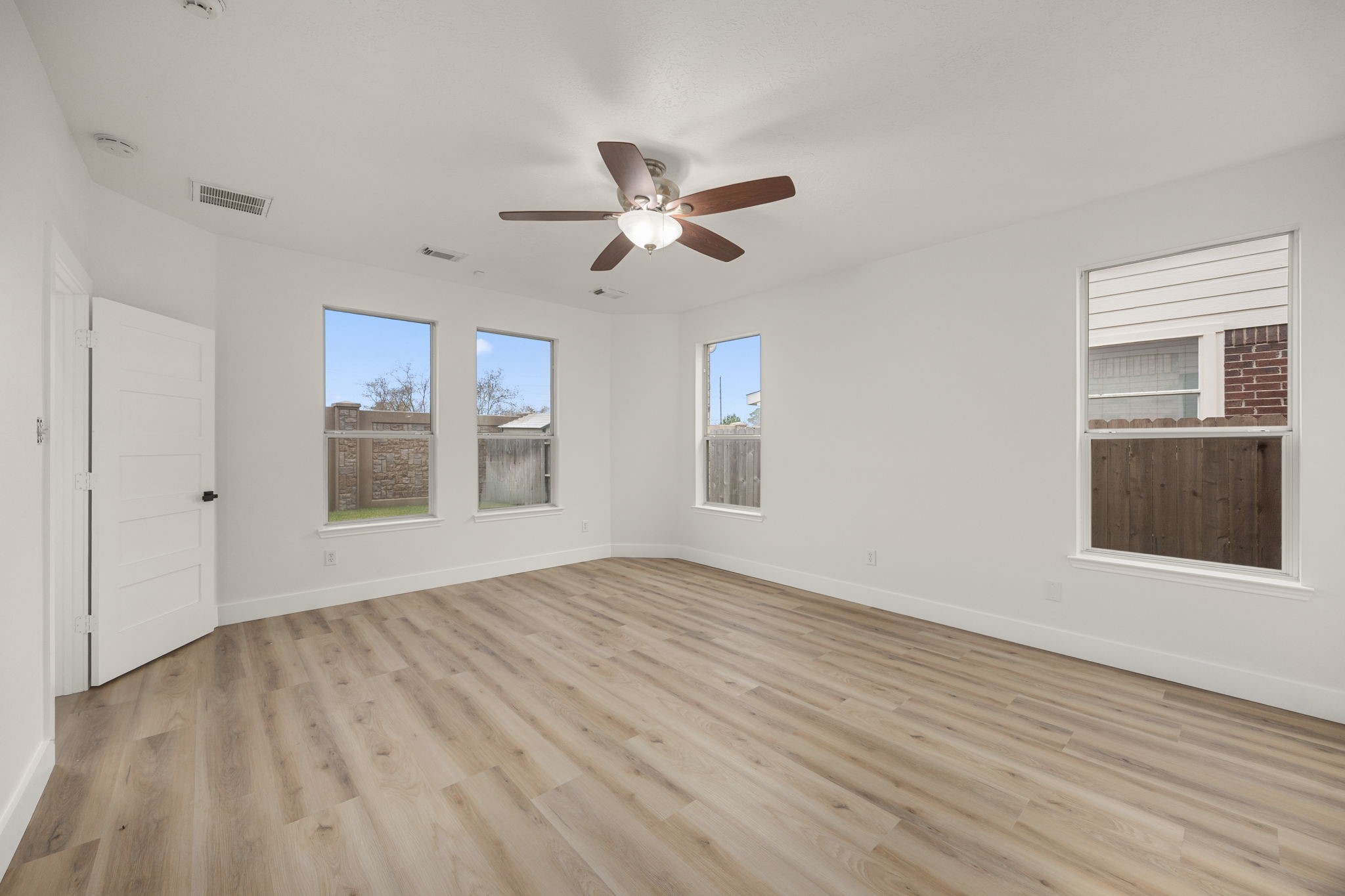 20923 Bayeux Lane Spring, TX 77388 - Photo 37 of 50 a view of empty room with wooden floor and fan